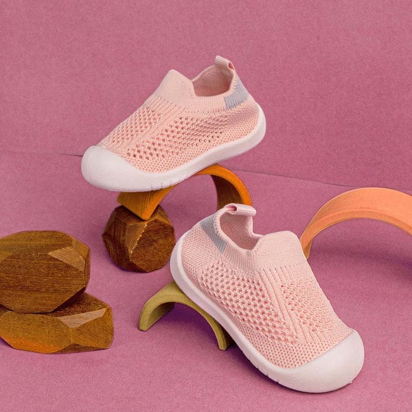 Pink breathable baby shoes designed for first walkers